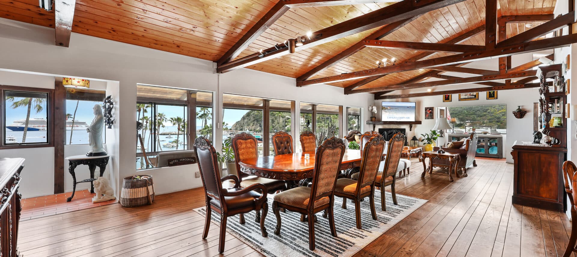 Dining room area in main living space with wood furniture and open consept