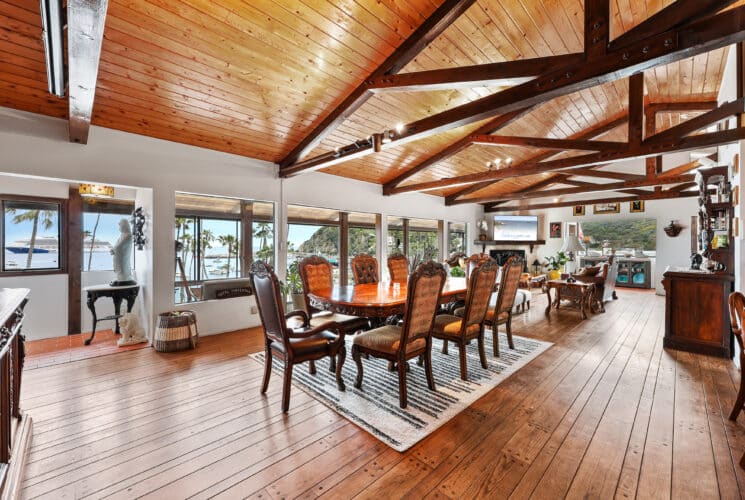 Dining room area in main living space with wood furniture and open consept