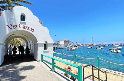 Via Casino - Showing ocean, beach and green railing with casino building in background